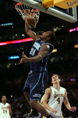 LOS ANGELES, CA - MAY 04:  Paul Millsap #24 of the Utah Jazz dunks in front of Luke Walton #4 of the Los Angeles Lakers in the first quarter of Game One of the Western Conference Semifinals during the 2008 NBA Playoffs at Staples Center on May 4, 2008 in 