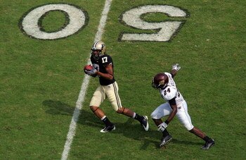 WEST LAFAYETTE, IN - SEPTEMBER 20: Wide receiver Aaron Valentin #17 of the Purdue Boilermakers makes a pass reception against LaVarus Williams #24 of the Central Michigan Chippewas at Ross-Ade Stadium on September 20, 2008 in West Lafayette, Indiana.  (Ph