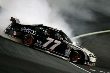 CONCORD, NC - OCTOBER 17:  Sam Hornish Jr., driver of the #77 Mobile 1 Dodge, loses control of his car during the NASCAR Sprint Cup Series NASCAR Banking 500 at Lowe's Motor Speedway on October 17, 2009 in Concord, North Carolina.  (Photo by Jason Smith/G