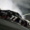 CONCORD, NC - OCTOBER 17:  Sam Hornish Jr., driver of the #77 Mobile 1 Dodge, loses control of his car during the NASCAR Sprint Cup Series NASCAR Banking 500 at Lowe's Motor Speedway on October 17, 2009 in Concord, North Carolina.  (Photo by Jason Smith/G