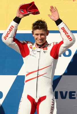 PHILLIP ISLAND, AUSTRALIA - OCTOBER 18:  Casey Stoner of Australia and the Ducati Marlboro Team celebrates on the podium after winning the Australian MotoGP, which is round 15 of the MotoGP World Championship, at Phillip Island Grand Prix Circuit on Octob