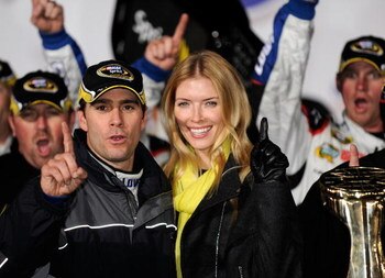 CONCORD, NC - OCTOBER 17:  Jimmie Johnson, driver of the #48 Lowe's Chevrolet, celebrates with his wife Chandra after winning the NASCAR Sprint Cup Series NASCAR Banking 500 at Lowe's Motor Speedway on October 17, 2009 in Concord, North Carolina.  (Photo 