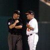 BALTIMORE- SEPTEMBER 11:  Head coach Dave Trembley #47 of the Baltimore Orioles argues a call with first base umpire Dale Scott during the game against the Los Angeles Angels at Camden Yards September 11, 2007 in Baltimore, Maryland. (Photo by Greg Fiume/
