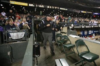 SEATTLE - SEPTEMBER 24:  Umpire Tim Welke #3 emergess from the tunnel after having reviewed a call on replay during the game between the Los Angeles Angels of Anaheim and the Seattle Mariners on September 24, 2008 at Safeco Field in Seattle, Washington. T