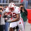 COLUMBUS, OH - OCTOBER 10:  Running back John Clay #32 of the Wisconsin Badgers runs with the ball against the Ohio State Buckeyes at Ohio Stadium on October 10, 2009 in Columbus, Ohio.  (Photo by Jamie Sabau/Getty Images)