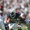 STATE COLLEGE, PA - SEPTEMBER 19: Running back Evan Royster #22 of the Penn State Nittany Lions carries the ball during a game against the Temple Owls on September 19, 2009 at Beaver Stadium in State College, Pennsylvania. (Photo by Hunter Martin/Getty Im