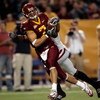 MINNEAPOLIS - NOVEMBER 17:  Wide receiver Eric Decker #7 of the Minnesota Golden Gophers catches a pass for a touchdown while being defended by Jack Ikegwuonu #6 of the Wisconsin Badgers in the second quarter at the Hubert H. Humphrey Metrodome November 1