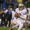 SOUTH BEND, IN - OCTOBER 03: Jake Locker #10 of the Washington Huskies rolls out to pass against the Notre Dame Fighting Irish on October 3, 2009 at Notre Dame Stadium in South Bend, Indiana. Notre Dame defeated Washington 37-30. (Photo by Jonathan Daniel