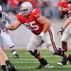 COLUMBUS, OH - OCTOBER 10:  Offensive Lineman Justin Boren #65 of the Ohio State Buckeyes blocks against the Wisconsin Badgers at Ohio Stadium on October 10, 2009 in Columbus, Ohio.  (Photo by Jamie Sabau/Getty Images)
