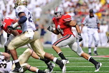 COLUMBUS, OH - SEPTEMBER 05:  Kurt Coleman #4 of the Ohio State Buckeyes chases down a Navy Midshipmen ballcarrier at Ohio Stadium on September 5, 2009 in Columbus, Ohio.  (Photo by Jamie Sabau/Getty Images)