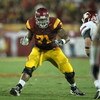 LOS ANGELES - SEPTEMBER 23:  Offensive tackle Charles Brown #71 of the USC Trojans blocks against the Washington State Cougars on September 23, 2009 at the Los Angeles Coliseum in Los Angeles, California.  USC won 27-6.   (Photo by Stephen Dunn/Getty Imag