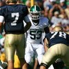 SOUTH BEND, IN - SEPTEMBER 19: Greg Jones #53 of the Michigan State Spartans awaits the start of play against the Notre Dame Fighting Irish on September 19, 2009 at Notre Dame Stadium in South Bend, Indiana. Notre Dame defeated Michigan State 33-30.  (Pho