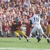 PASADENA, CA - JANUARY 1:  Joe McKnight #4 of the USC Trojans carries the ball against Navorro Bowman #18 of the Penn State Nittany Lions on January 1, 2009 at the Rose Bowl in Pasadena, California.  USC won 38-24.  (Photo by Jeff Golden/Getty Images) 
