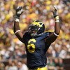 ANN ARBOR, MI - SEPTEMBER 19:  Cornerback Donovan Warren #6 of the Michigan Wolverines exhorts the crowd in the game with the Eastern Michigan Eagles at Michigan Stadium on September 19, 2009 in Ann Arbor, Michigan.  Michigan won 45-17.  (Photo by Stephen