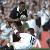 18 Jun 1995:  Jonah Lomu of New Zealand charges through the tackle of Mike Catt of England to score a try during the Rugby World Cup Semi Final at the Newlands Stadium in Cape Town, South Africa. New Zealand won the match 45-29.  \ Mandatory Credit: Ben R