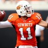 STILLWATER, OK - SEPTEMBER 5: Quarterback Zac Robinson of the Oklahoma State Cowboys looks to pass against the Georgia Bulldogs in the second quarter of the game at Boone Pickens Stadium on September 5, 2009 in Stillwater, Oklahoma. (Photo by Christian Pe