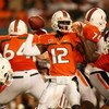 FORT LAUDERDALE, FL - OCTOBER 03: Quarterback Jacory Harris #12 of the Miami Hurricanes throws a pass against the Oklahoma Sooners at Land Shark Stadium on October 3, 2009 in Fort Lauderdale, Florida. Miami defeated Oklahoma 21-20. (Photo by Doug Benc/Get