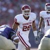 SEATTLE - SEPTEMBER 13:  Travis Lewis #28 of the Oklahoma Sooners lines up in position during the game against the Washington Huskies on September 13, 2008 at Husky Stadium in Seattle, Washington. The Sooners defeated the Huskies 55-14.(Photo by Otto Greu