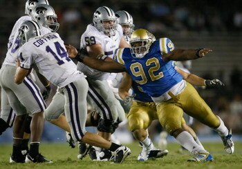 PASADENA, CA - SEPTEMBER 19:  Brian Price #92 of the UCLA Bruins hurries quarterback Carson Coffman #14 of the Kansas State Wildcats in the fourth quarter at the Rose Bowl on September 19, 2009 in Pasadena, California. UCLA defeated Kansas State 23-9.  (P