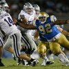 PASADENA, CA - SEPTEMBER 19:  Brian Price #92 of the UCLA Bruins hurries quarterback Carson Coffman #14 of the Kansas State Wildcats in the fourth quarter at the Rose Bowl on September 19, 2009 in Pasadena, California. UCLA defeated Kansas State 23-9.  (P