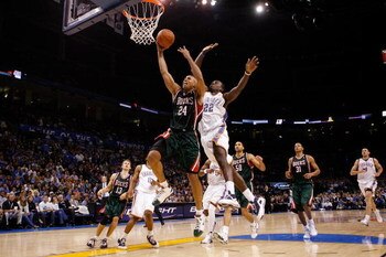 OKLAHOMA CITY - OCTOBER 29:  Richard Jefferson #24 of the Milwaukee Bucks makes a shot over Jeff Green #22 of the Oklahoma City Thunder at the Ford Center on October 29, 2008 in Oklahoma City, Oklahoma. NOTE TO USER: User expressly acknowledges and agrees