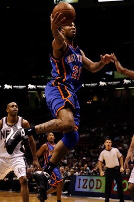 EAST RUTHERFORD, NJ - OCTOBER 20:  Wilson Chandler #21 of the New York Knicks goes up for a shot against the New Jersey Nets during the first half of a pre-season game on October 20, 2008 at the IZOD Center in East Rutherford, New Jersey. NOTE TO USER: Us