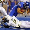 BOISE, ID - SEPTEMBER 3: Safety T.J Ward #2 of the Oregon Ducks  tackles tight end Kyle Efaw #80 of the Boise State Broncos in the second quarter of the game on September 3, 2009 at Bronco Stadium in Boise, Idaho. Boise State won the game 19-8. (Photo by 