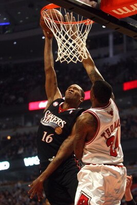 CHICAGO - DECEMBER 02:  Marreese Speights #16 of the Philadelphia 76ers attempts a shot against Tyrus Thomas #24 of the Chicago Bulls at the United Center on December 2, 2008 in Chicago, Illinois.  NOTE TO USER: User expressly acknowledges and agrees that