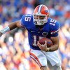 GAINESVILLE, FL - OCTOBER 17: Quarterback Tim Tebow #15 of the Florida Gators rushes upfield against the University of Arkansas Razorbacks October 17, 2009 at Ben Hill Griffin Stadium in Gainesville, Florida.  (Photo by Al Messerschmidt/Getty Images)