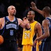 LOS ANGELES, CA - APRIL 21:  Carlos Boozer #5 of the Utah Jazz gives teammate Ronnie Brewer #9 a high five as Kobe Bryant #24 of the Los Angeles Lakers stands between them in Game Two of the Western Conference Quarterfinals during the 2009 NBA Playoffs at