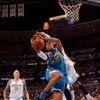 DENVER - APRIL 29:  David West #30 of the New Orleans Hornets is fouled by Carmelo Anthony #15 of the Denver Nuggets in Game Five of the Western Conference Quarterfinals during the 2009 NBA Playoffs at Pepsi Center on April 29, 2009 in Denver, Colorado. T