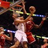 EAST RUTHERFORD, NJ - NOVEMBER 18:  Brook Lopez #11 of the New Jersey Nets attempts a layup against Ben Wallace #4 of the Cleveland Cavaliers at the Izod Center on November 18, 2008 in East Rutherford, New Jersey. NOTE TO USER: User expressly acknowledges