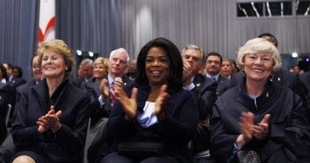 COPENHAGEN, DENMARK - OCTOBER 2: Television talk show host Oprah Winfrey, center, sits with other members of the U.S. delegation as U.S. President Barack Obama finishes his presentation in support of Chicago as the host city for the 2016 Summer Olympic Ga