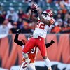 CINCINNATI - DECEMBER 28: Dwayne Bowe #82 of the Kansas City Chiefs catches a pass while defended by Leon Hall #29 of the Cincinnati Bengals during the NFL game on December 28, 2008 at Paul Brown Stadium in Cincinnati, Ohio. (Photo by Andy Lyons/Getty Ima