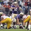 SEATTLE - SEPTEMBER 19:  Quarterback Jake Locker #10 of the Washington Huskies calls the play during the game against the USC Trojans on September 19, 2009 at Husky Stadium in Seattle, Washington. The Huskies defeated the Trojans 16-13. (Photo by Otto Gre