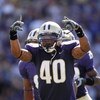 SEATTLE - SEPTEMBER 6:  Mason Foster #40 of the Washington Huskies signals to the sideline during their game against the BYU Cougars on September 6, 2008 at Husky Stadium in Seattle, Washington. The Cougars defeated the Huskies 28-27. (Photo by Otto Greul
