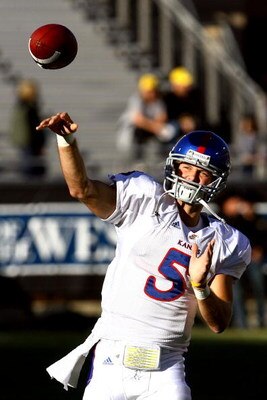 BOULDER, CO - OCTOBER 17: Todd Reesing #5 of the Kansas Jayhawks throws a pass against the Colorado Buffaloes during the game at Folsom Field on October 17, 2009 in Boulder, Colorado. (Photo by Garrett W. Ellwood/Getty Images)