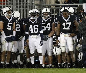 STATE COLLEGE, PA - SEPTEMBER 26:  Daryll Clark of the Penn State Nittnay Lions stands on the sideline with teammates just prior to losing to the Iowa Hawkeyes 21-10 on September 26, 2009 at Beaver Stadium in State College, Pennsylvania.  (Photo by Gregor