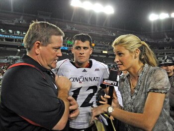 TAMPA, FL - OCTOBER 15: ESPN commentator Erin Andrews interviews coach Brian Kelly and quarterback Zach Collaros #12 of the Cincinnati Bearcats  after play against the University of South Florida Bulls October 15, 2009 at Raymond James Stadium in Tampa, F