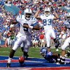 LAWRENCE, KS - SEPTEMBER 19:  Quarterback Thaddeus Lewis #9 of the Duke Blue Devils crosses the goal line for a touchdown during the 1st half of the game against the Kansas Jayhawks at Kivisto Field at Memorial Stadium on September 19, 2009 in Lawrence, K