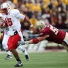 CHESTNUT HILL, MA - OCTOBER 17:  Russell Wilson #16 of the North Carolina State Wolf Pack  scrambles as Austin Giles #52 of the Boston College Eagles defends on October 17, 2009 at Alumni Stadium in Chestnut Hill, Massachusetts.  (Photo by Elsa/Getty Imag