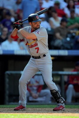 DENVER - SEPTEMBER 27:  Mark DeRosa #7 of the St. Louis Cardinals takes an at bat against the Colorado Rockies at Coors Field on September 27, 2009 in Denver, Colorado. The Rockies defeated the Cardinals 4-3.  (Photo by Doug Pensinger/Getty Images)