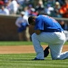 CHICAGO - AUGUST 30: Carlos Zambrano #38 of the Chicago Cubs takes a moment to himself before the first pitch against the New York Mets on August 30, 2009 at Wrigley Field in Chicago, Illinois. The Mets defeated the Cubs 4-1. (Photo by Jonathan Daniel/Get