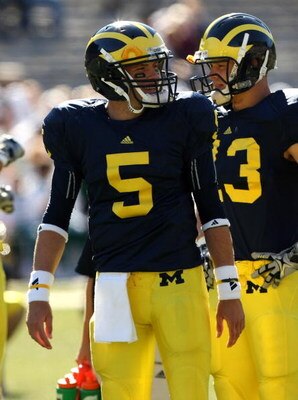ANN ARBOR, MI - SEPTEMBER 19:  Quarterback Tate Forcier #5 of the Michigan Wolverines warms up for the game against the Eastern Michigan Eagles at Michigan Stadium on September 19, 2009 in Ann Arbor, Michigan.  Michigan won 45-17.  (Photo by Stephen Dunn/