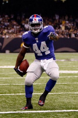 NEW ORLEANS - OCTOBER 18:  Ahmad Bradshaw #44 of the New York Giants scores a touchdown against the New Orleans Saints at the Louisiana Superdome on October 18, 2009 in New Orleans, Louisiana.  (Photo by Chris Graythen/Getty Images)