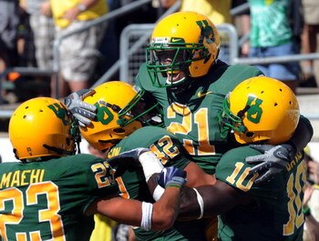 EUGENE, OR - SEPTEMBER 26: LaMichael James #21 of the Oregon Ducks celebrates his touchdown with his teammates Jeff Maehl #23, David Paulson #42 and D.J. Davis #10 in the second quarter of the game against the California Bears at Autzen Stadium on Septemb