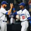 ATLANTA - AUGUST 02:  Orlando Hudson #13 of the Los Angeles Dodgers congratulates closer Ramon Troncoso #38 after a 9-1 win over the Atlanta Braves on August 2, 2009 at Turner Field in Atlanta, Georgia.  (Photo by Kevin C. Cox/Getty Images)