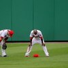 WASHINGTON - AUGUST 06:  Leftfielder Josh Willingham #16 and centerfielder Nyjer Morgan #1 of the Washington Nationals await a pitching change against the Florida Marlins at Nationals Park on August 6, 2009 in Washington, DC. The Nationals defeated the Ma