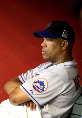 PHOENIX - AUGUST 11:  Starting pitcher Livan Hernandez #61 of the New York Mets reacts in the dugout after being removed from the major league baseball game against the Arizona Diamondbacks at Chase Field on August 11, 2009 in Phoenix, Arizona.  (Photo by