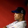 PHOENIX - AUGUST 11:  Starting pitcher Livan Hernandez #61 of the New York Mets reacts in the dugout after being removed from the major league baseball game against the Arizona Diamondbacks at Chase Field on August 11, 2009 in Phoenix, Arizona.  (Photo by